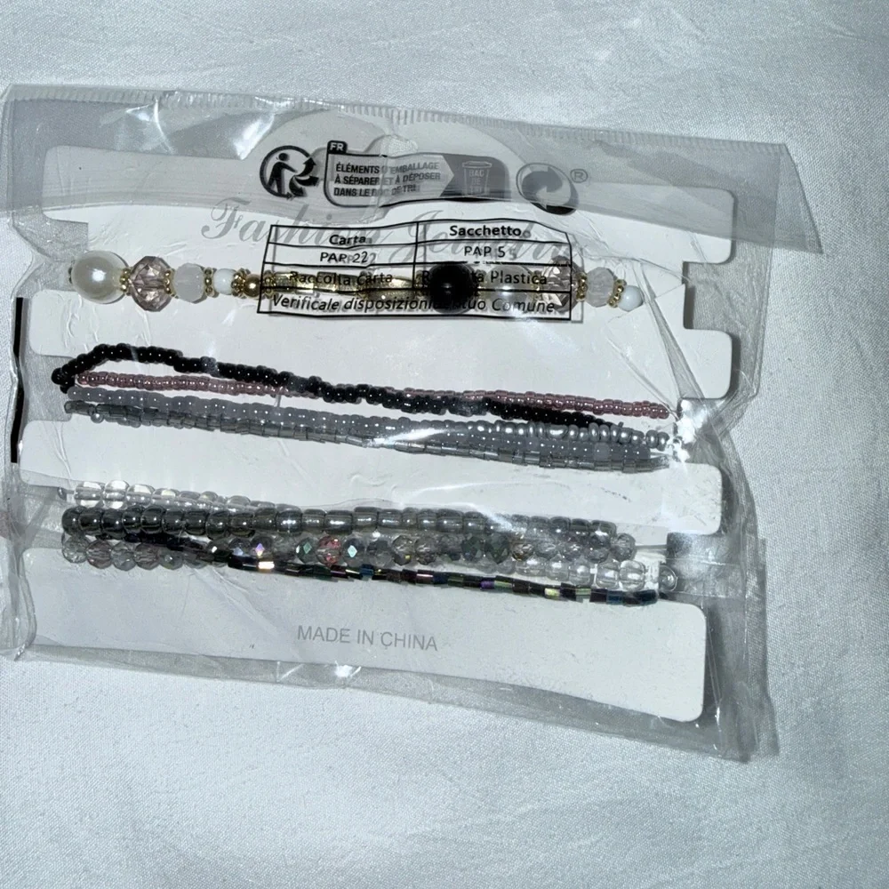 NWT black, silver, white Beaded Bracelet Set